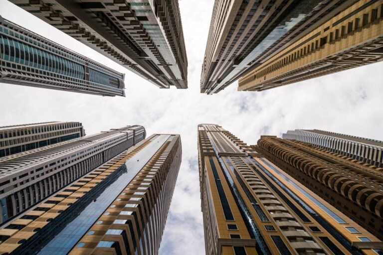 dramatic-perspective-with-low-angle-view-skyscrapers-looking-up-sky-dubai-vanishing-point